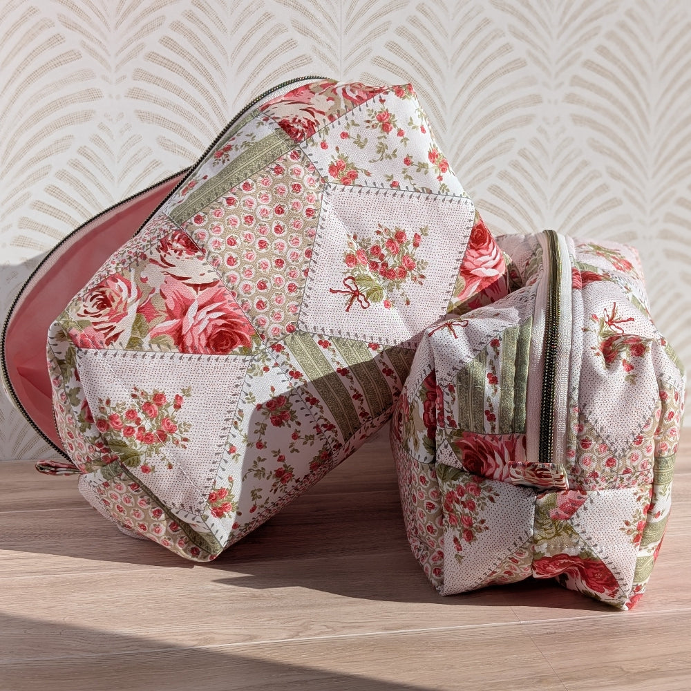 Floral patterned makeup bag on a wooden surface with a light background