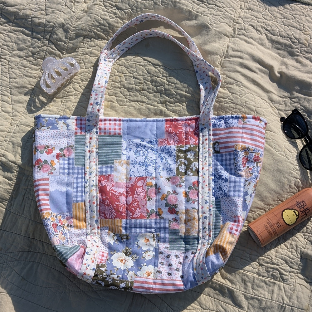 Patchwork handbag on a textured surface